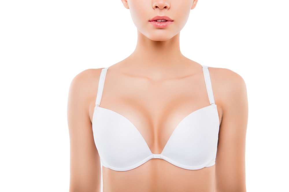 patient model wearing white bra