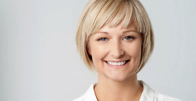 Female patient model smiling