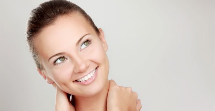 Dermabrasion female patient model smiling